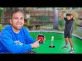 Secretly Putting Golf Ball Ejector in Holes at Mini Golf Course