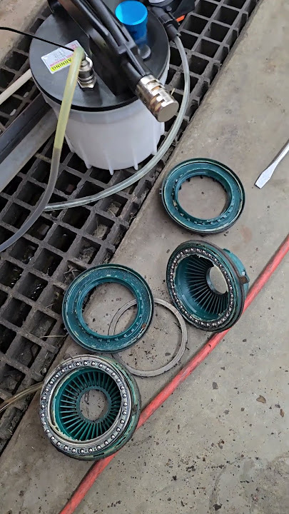 Ford plastic Strut bearing mounts!  Got to say they lasted 146,000 miles.  #fordedgesport