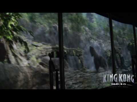 King Kong 360 3D - Return to Skull Island; The Full Ride Experience on the Universal Studios Hollywood Studio Tour in FULL 1080p HD! (Ride Segment starts at 6:26 ) from the original teaser trailer to getting glasses, to technical difficulties to the final amazing experience! Finally Kong returns to the Universal Studios Hollywood Studio Tour after the devastating fire in 2008 which burned down the original animatronic Kong experience.This King Kong experience is unbelievable! Filmed on 6/26/10 during soft opening / technical rehearsals before the 7/1/10 grand opening with a Sony HDR-CX550v HD camcorder. We went through the building twice, and you get a rare view of the inside of the building with the lights on after it didn't work the first time. Our tour guide wanted us to experience it, so we went through it again and it worked and it was UNBELIEVABLE! You really have to experience it live to get the full effect and feel all the excitiment! Enjoy! King Kong 360 3D, created by Peter Jackson, features the latest in digital technology, featuting a giant soundstage with seamless 360 projection screens, 3D High Def projections at 60fps, water, sound, smell, and wind effects, and a hyrdaulic platform system that rocks the tram, all while you have an epic enounter and battle between huge T-rex, V-rex and raptor dinosaurs, huge spiders, bats, Skull Island's jungle and King Kong himself! For more info, please visit www.universalstudioshollywood.com