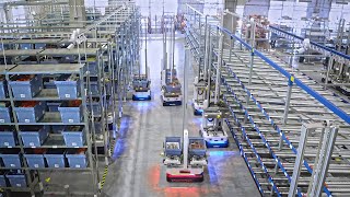 Major egrocer uses robots to consolidate, buffer and dispatch orders in micro fulfillment center