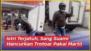 Istri Terjatuh di Atas Trotoar, Sang Suami Hancurkan Trotoar Pakai Martil