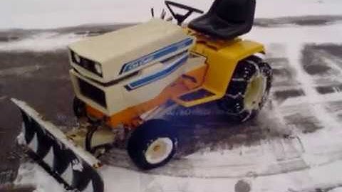 Cub Cadet 1650 Plowing Snow