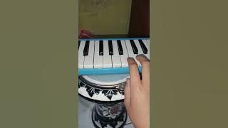 Not Pianika Basuri Ikan Dalam Kolam