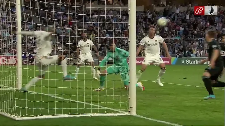 INCREDIBLE SAVE: Jonathan Bond flies around the bo...