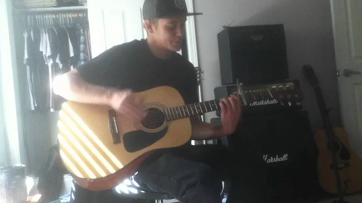 Jared Millard on the guitar