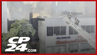 Fire engulfs roof of building in the Entertainment District