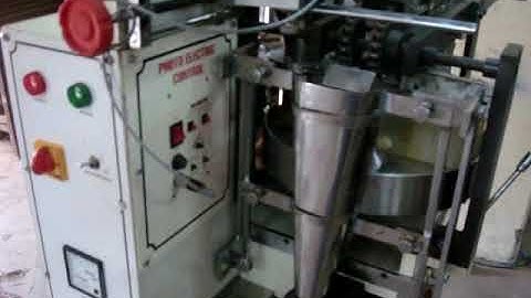 VERTICAL FFS MACHINE WITH BUCKET CONVEYOR