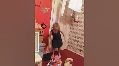 Ellesse playing in my bedroom with her dolls