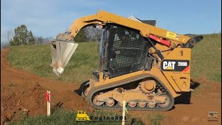 Caterpillar 289D Cutting in a Driveway