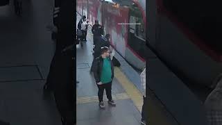 Security guard saves distracted woman's life from oncoming tram