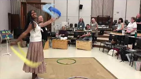 Teachers Orchestrating "Sally Go Round The Sun" At...