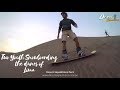 Two Youth snowboarding the dunes of Lima ( Chilca Desert Sandboarding)