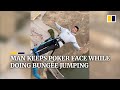 Chinese man calmly bungee jumps without emotion