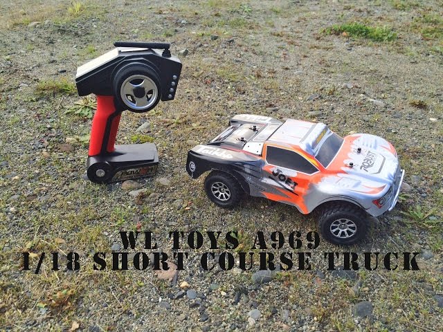 Wltoys A969 2 4g Rc Truck Gearbest 1 18 Scale Suitable For Indoor And Outdoor Control Four Wheel Independent Suspension Come With 4 Shock Absorbers Proportional Steering