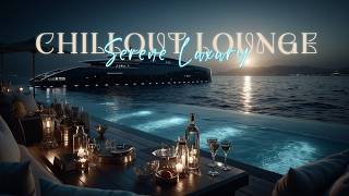 Deck overlooking a pool and the sea with a dimly lit yacht in the background, and moon, glasses, bottles and candles