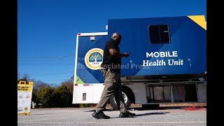 South Carolina mobile clinic offers vaccines in area seeing measles outbreak with hundreds of cases
