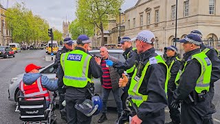 POLICE ARREST AND HANDCUFF MAN OUTSIDE HORSE GUARDS  NEW HORSES, but no Kings Guard!