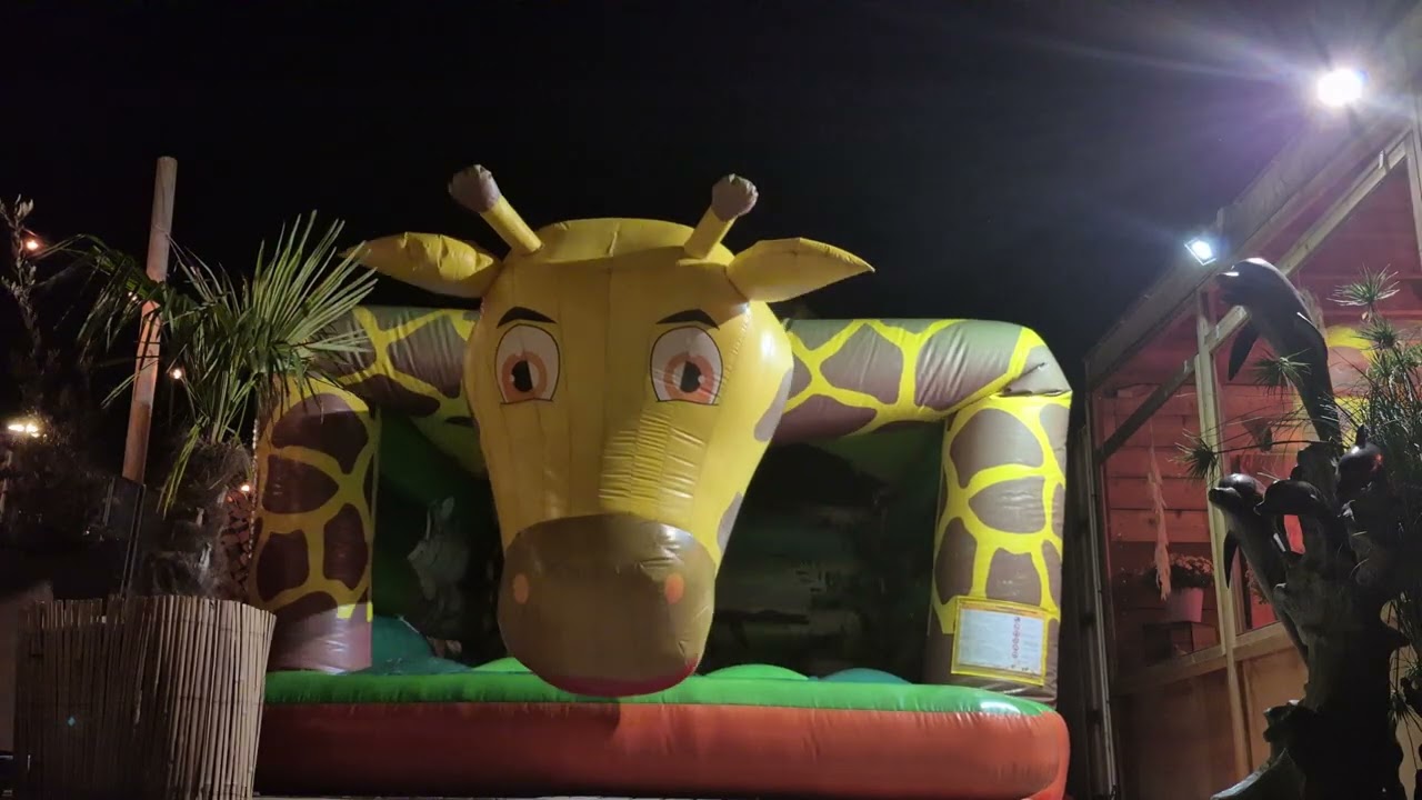Giraffe bounce house off-jump