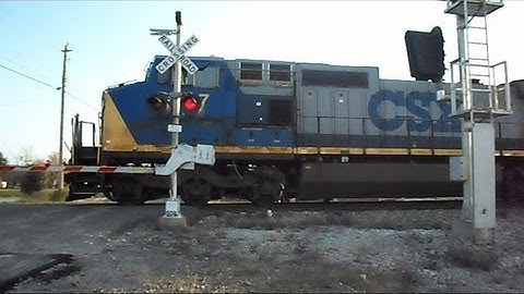 CSX Freight Train Through Railroad Crossing