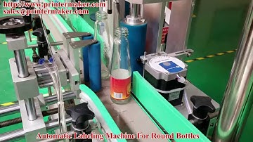 Automatic labeling machine for round bottles