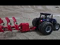 Siku Control 32 New Holland T7 RC Tractor Plowing Soil with Rotary Plow 