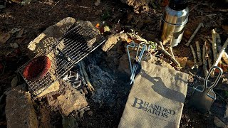 Grill grate and tent stakes. My new woods kitchen set up