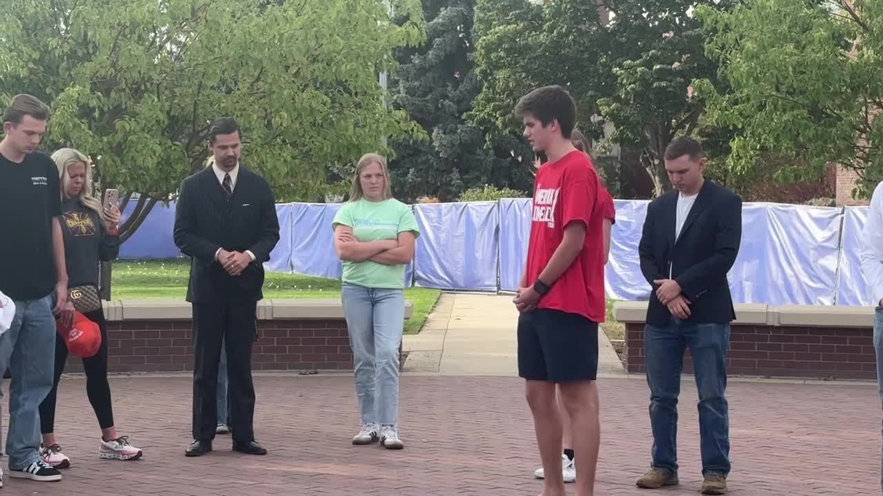 Dozens of Boise State students gather for a vigil for Charlie Kirk