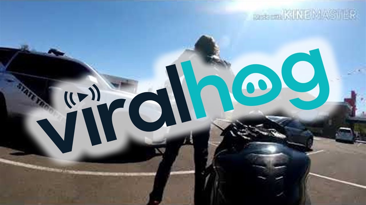 Driver Throws Bottle at Motorbike Rider || ViralHog