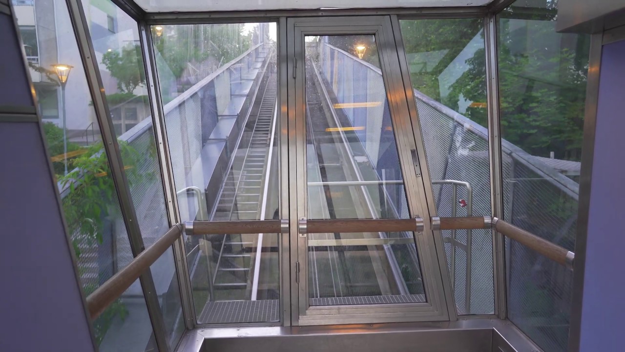 Sweden, Skärholmen Bergbana - KONE incline elevator - going down