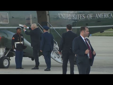 Pres. Trump Helps Marine With Wind-Blown Hat