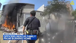 Police officers rescue family from burning home in Brooklyn