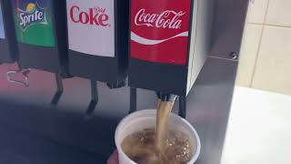 Getting a coke at burger King in Spokane airport