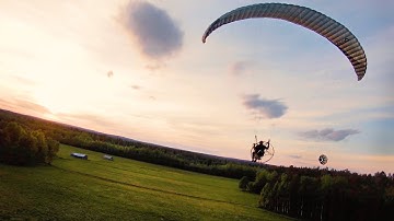 FPV drone chasing paramotor