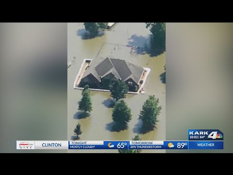 Wooster Flooding Family Builds Wall Around House 