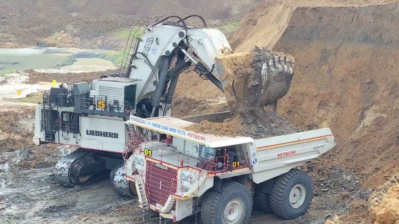 I LIKE THIS EXVATER LIEBHEER 996 IN FULLY LEADING  WITH HITACHI DUMPER