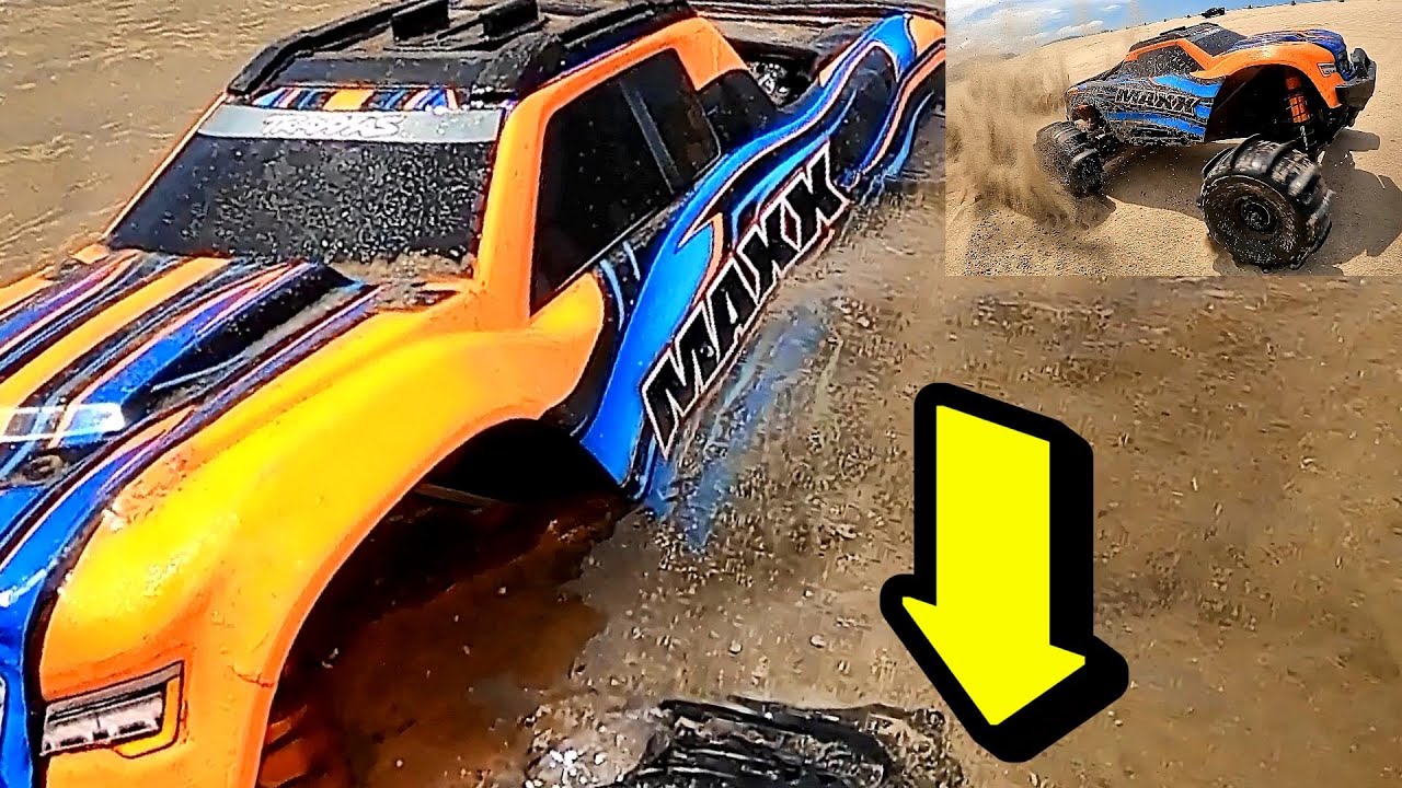 Traxxas Maxx with paddle tires on the beach YouTube