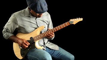 Ede Wright plays Rick Toone Goshawk guitar.