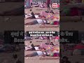 मुंबई में गर्मी का कहर.. राहत के लिए Beach किनारे सोते दिखे लोग..