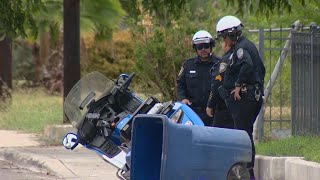 Officer on motorcycle escorting funeral injured after driver interrupts funeral procession