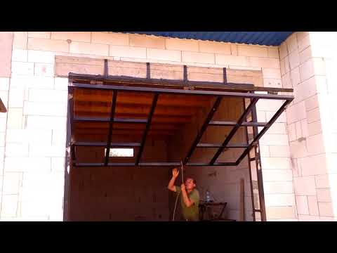 Video: Kaip pakeisti garažo durų laidą?