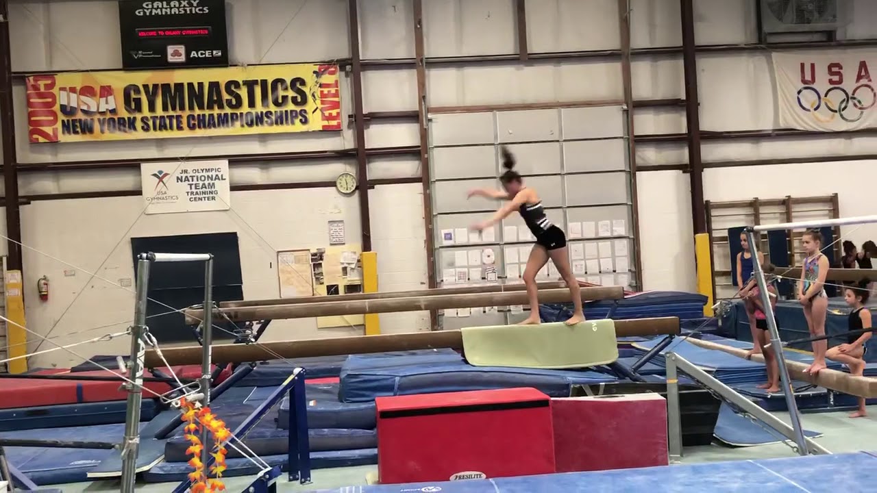 Handspring layout on middle beam - YouTube