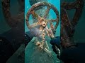 Skeleton Chained to Offshore Oil Valve Wheel Safe (Seabed Rig Base