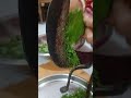 Chopping jute leaves