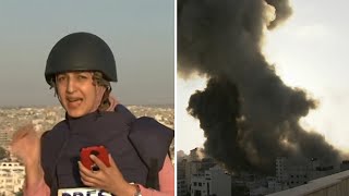 Journalist rushes for cover as Gaza building destroyed during live report A journalist was reporting live from a rooftop in Gaza when a neighbouring building was destroyed by an Israeli airstrike. Gaza-based journalist Youmna Al ..., From YouTubeVideos