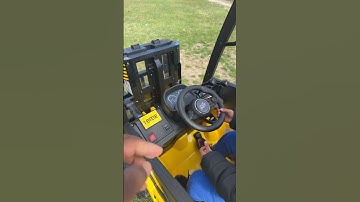 Omar is learning how to drive a forklift