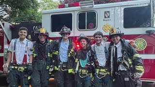New York students graduate, put out fire in the same day