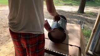 Stripping paint off an Antique Milk Can