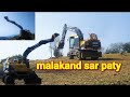 Loading  transporting the volvo excavator in the new warking malakand sar paty
