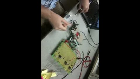 Mechanical Arm controlled by embedded blue tooth device and Wii remote control