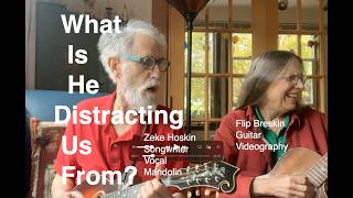 What Is He Distracting Us From?